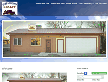 Tablet Screenshot of homeandcountryrealty.com